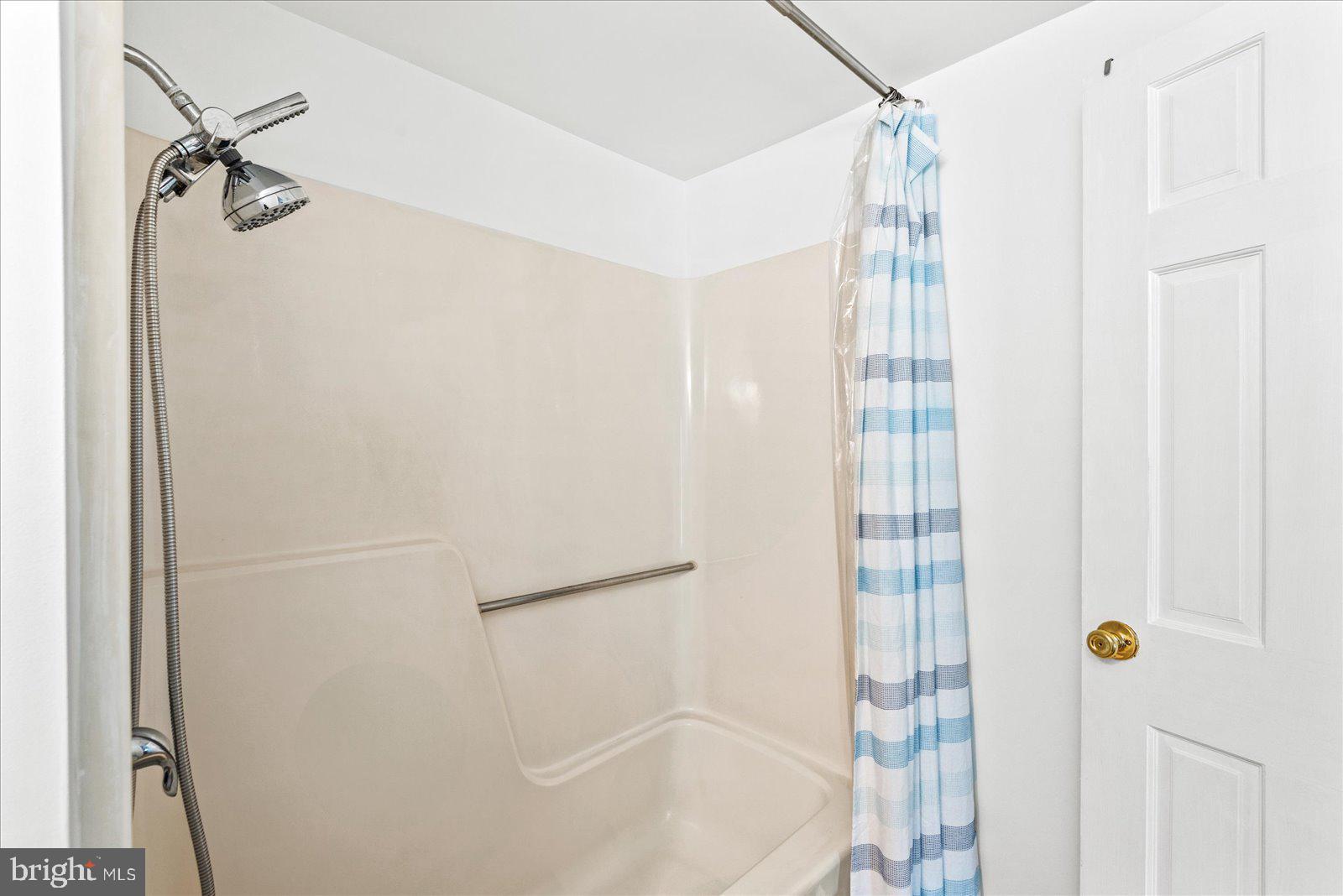 2931 Vawter Corner Road Louisa, VA 23093 - Photo 23 of 47 a bathroom with a shower and a glass door