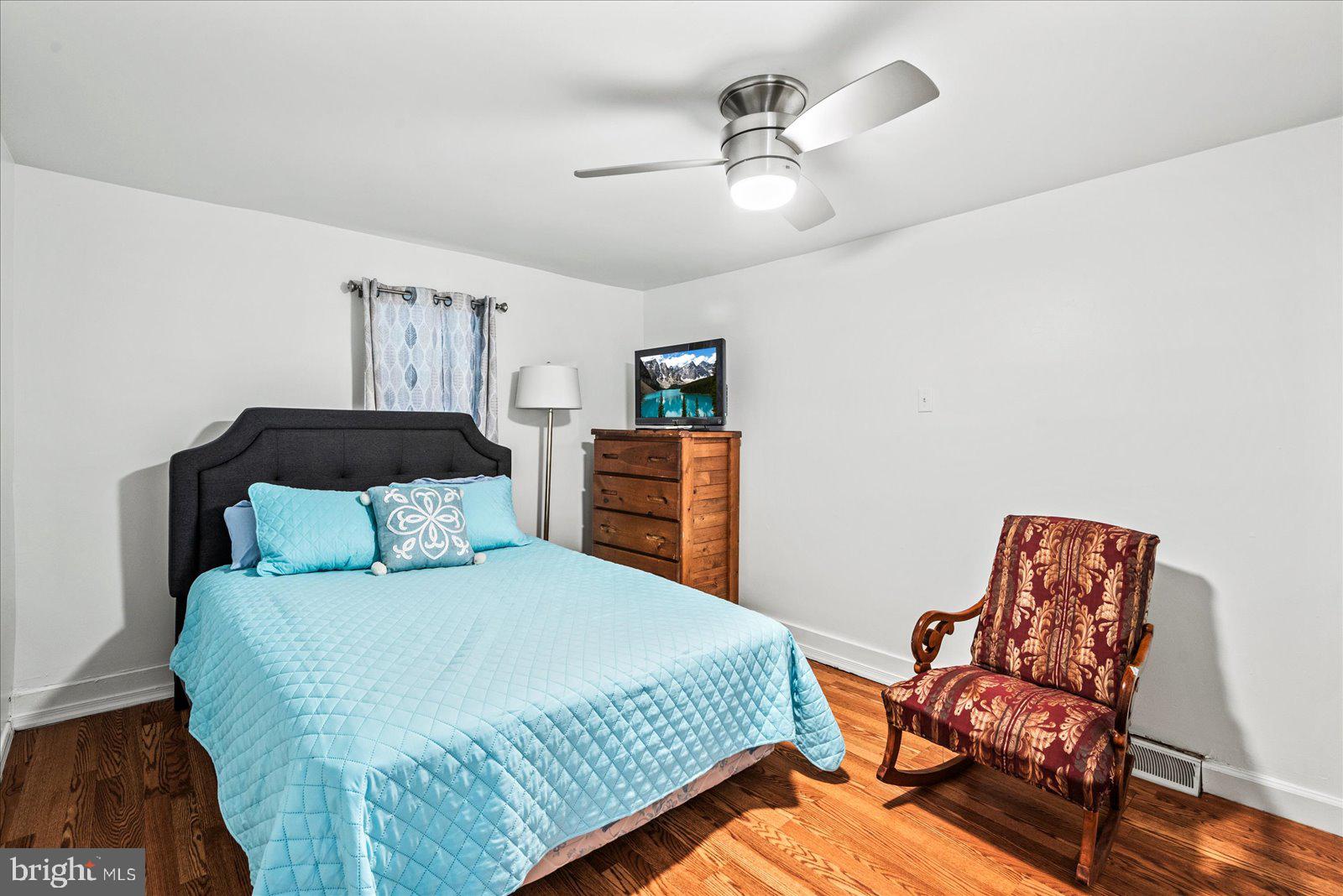 2931 Vawter Corner Road Louisa, VA 23093 - Photo 25 of 47 a bedroom with a bed and chair