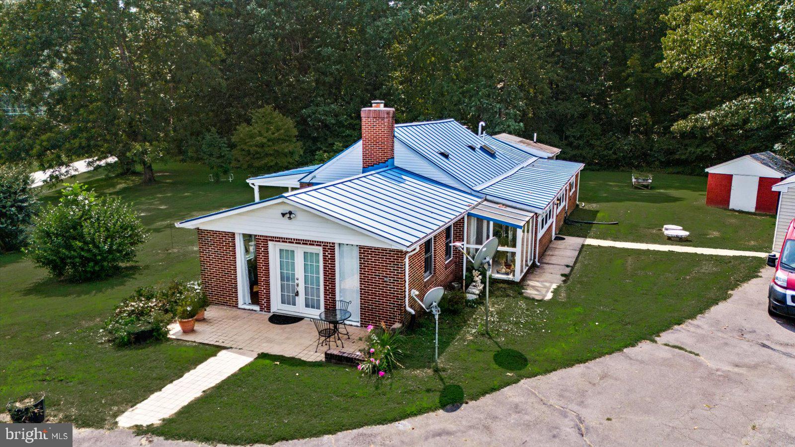 2931 Vawter Corner Road Louisa, VA 23093 - Photo 27 of 47 front view of a house with a yard
