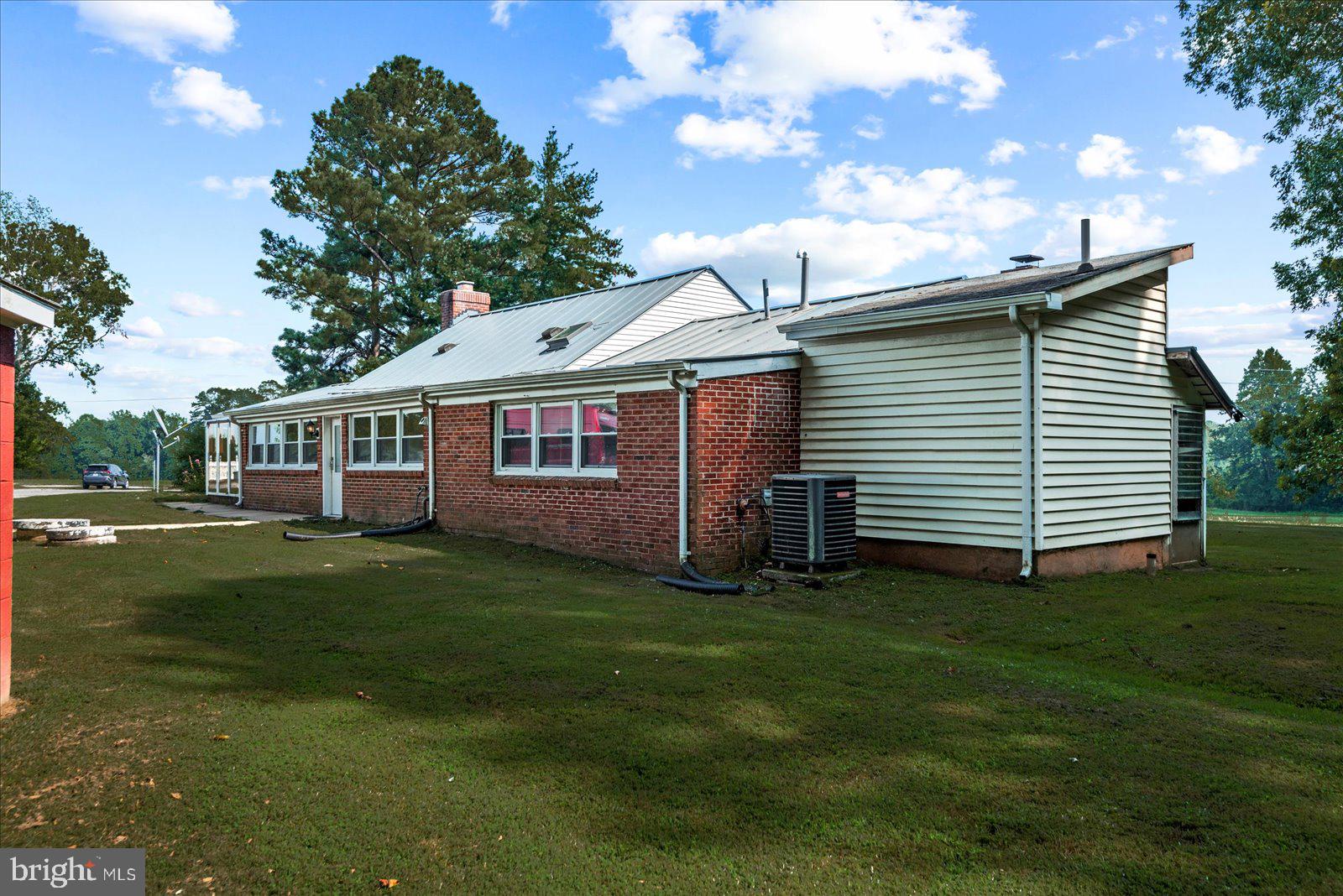 2931 Vawter Corner Road Louisa, VA 23093 - Photo 28 of 47 a front view of a house with a garden
