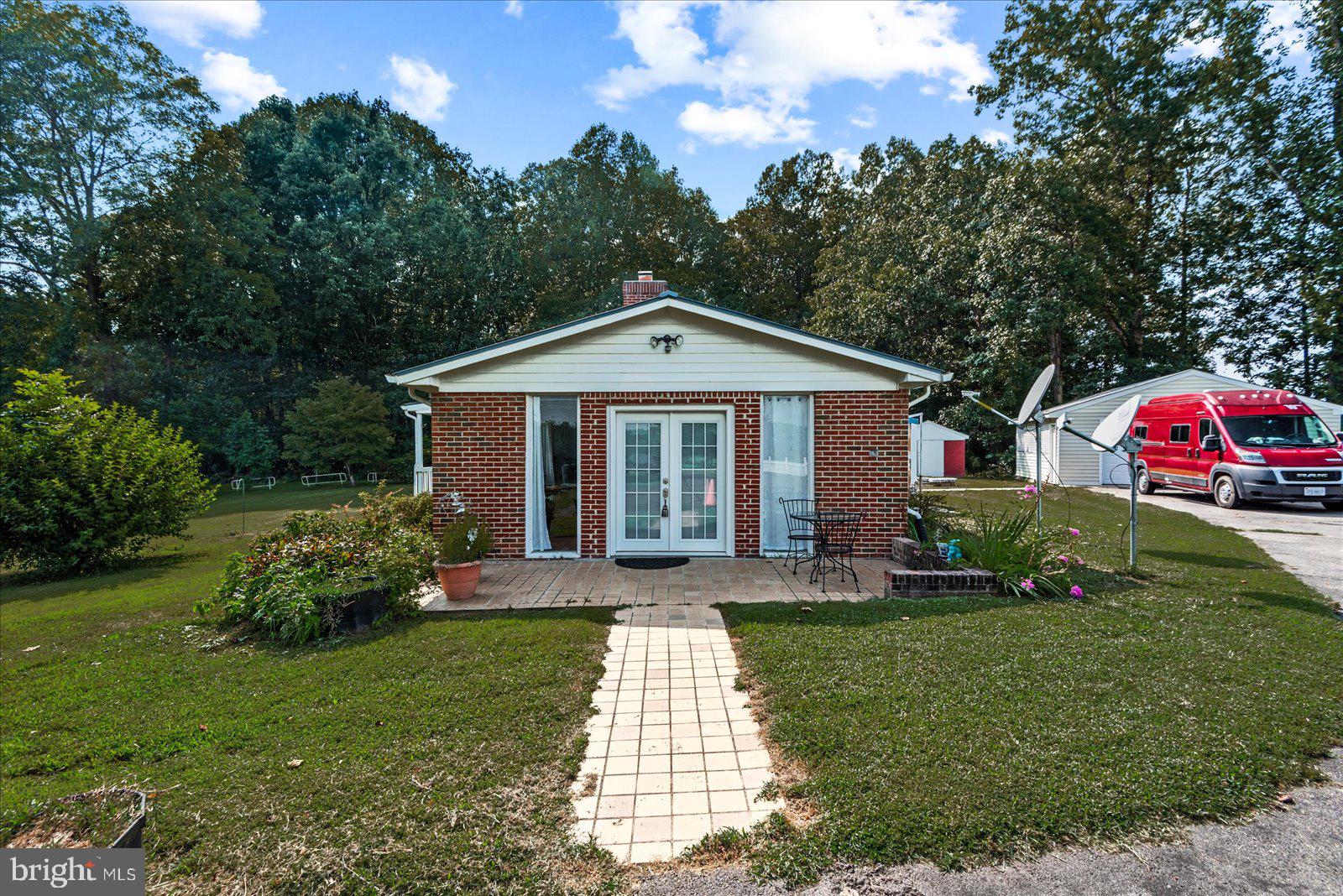 2931 Vawter Corner Road Louisa, VA 23093 - Photo 29 of 47 a front view of a house with garden