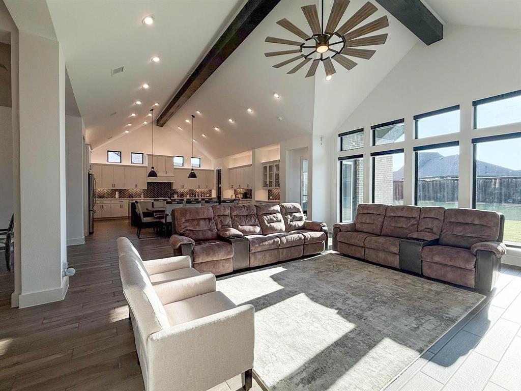 1620 Ripasso Way McLendon-Chisholm, TX 75032 - Photo 33 of 40 a living room with furniture and a large window