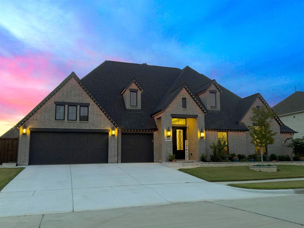 1620 Ripasso Way McLendon-Chisholm, TX 75032 - Photo 4 of 40 a front view of a house with a yard