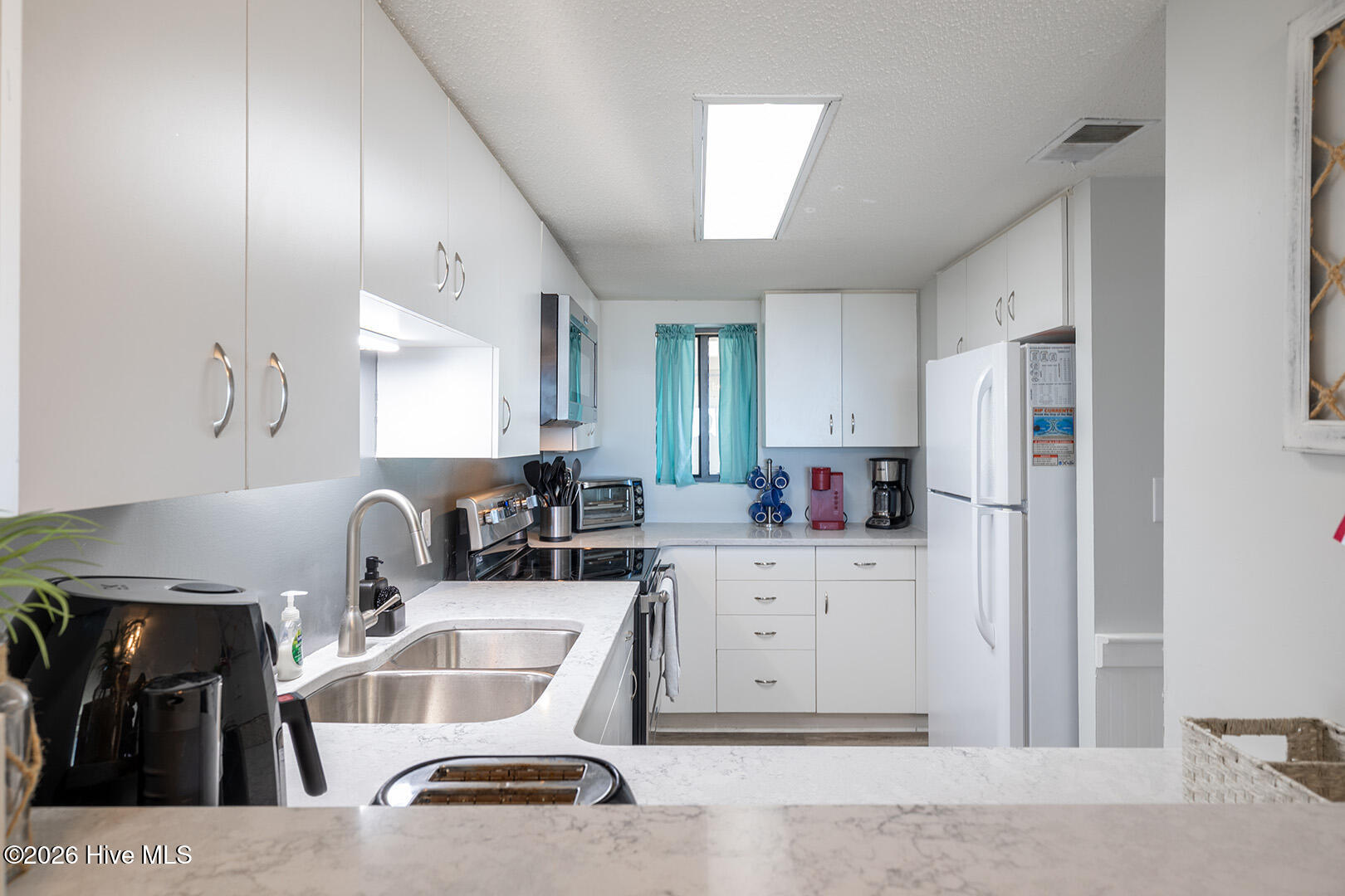 8801 Reed Drive, Unit 115W Emerald Isle, NC 28594 - Photo 4 of 30 Kitchen