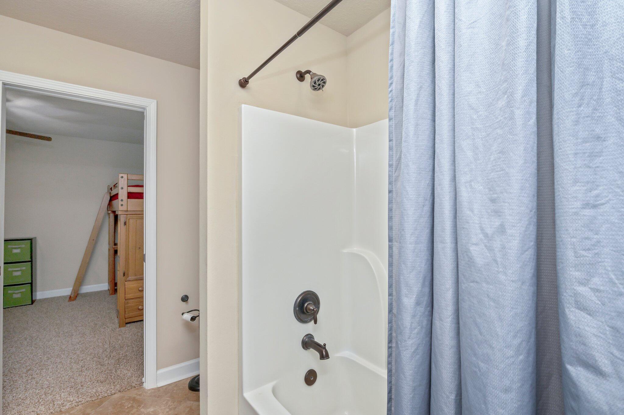 4558 Hermosa Road Crestview, FL 32539 - Photo 36 of 48 a bathroom with a shower