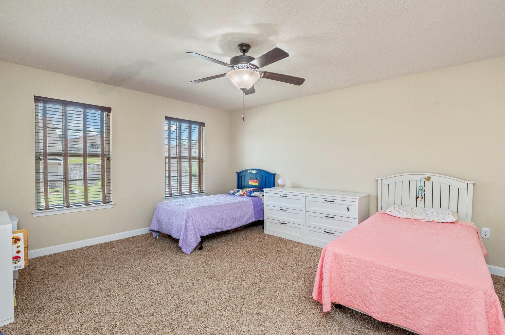 4558 Hermosa Road Crestview, FL 32539 - Photo 41 of 48 a bedroom with furniture and a window