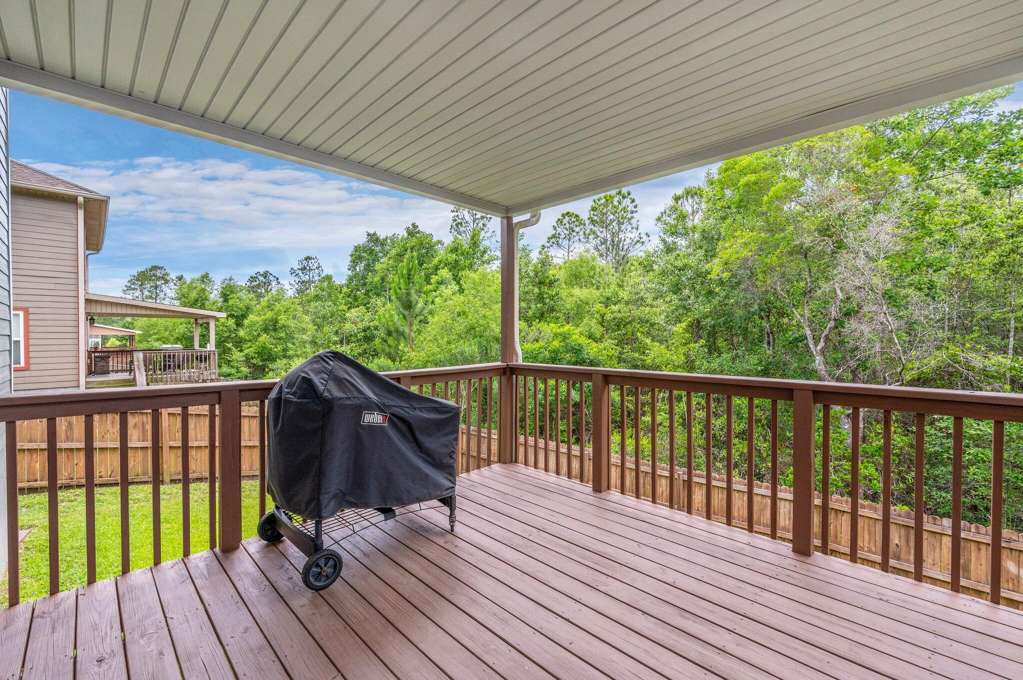 4558 Hermosa Road Crestview, FL 32539 - Photo 47 of 48 a view of balcony with wooden floor