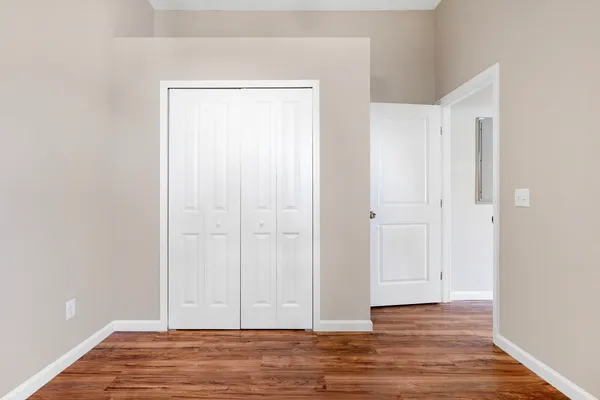 a view of room with hardwood floor