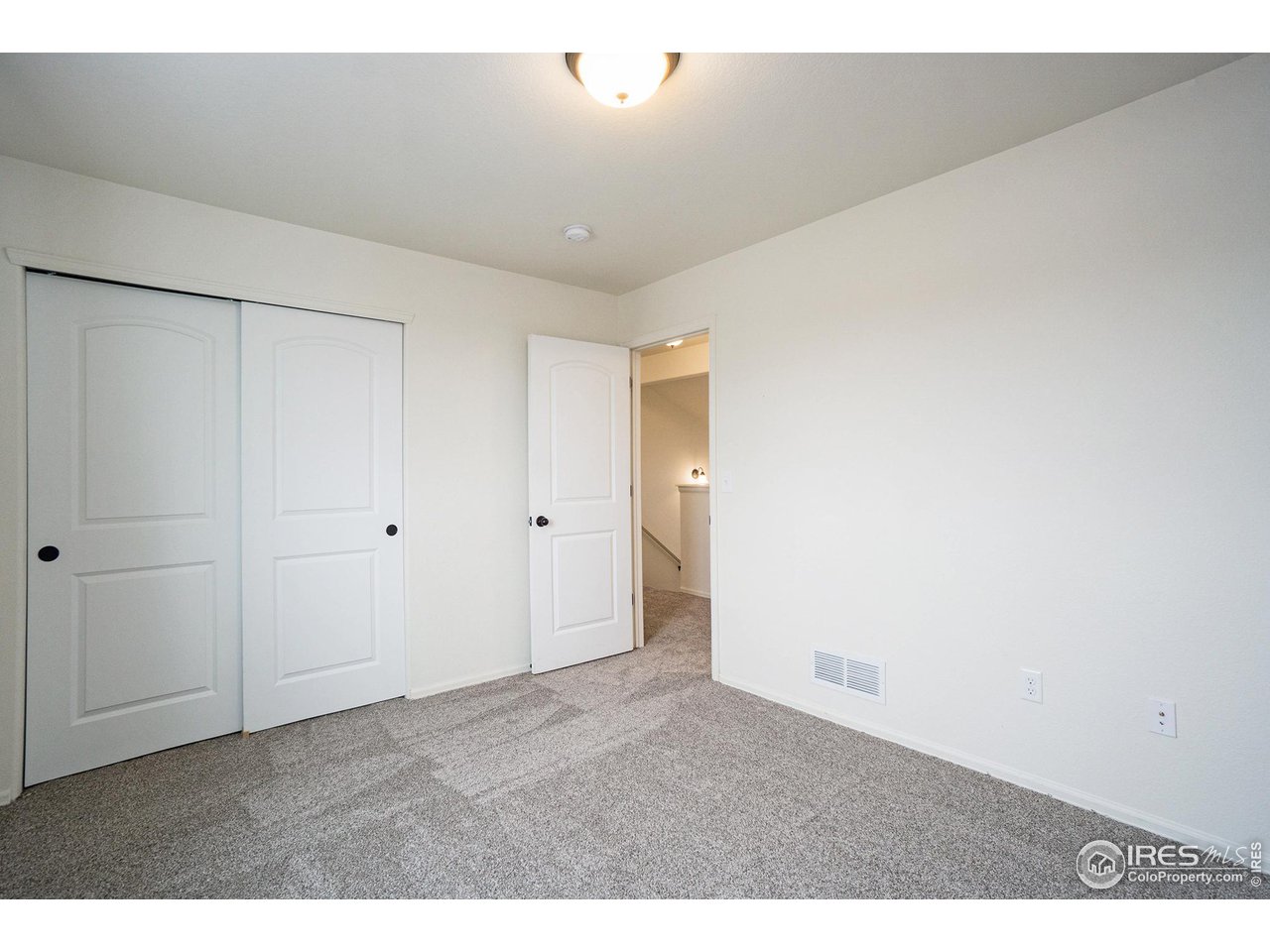 4386 Cypress Ridge Lane Wellington, CO 80549 - Photo 22 of 30 a view of an empty room