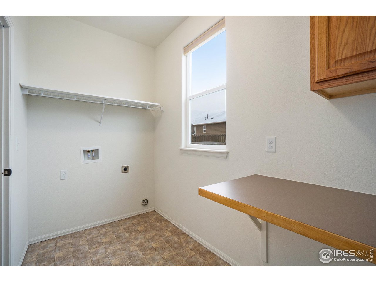 4386 Cypress Ridge Lane Wellington, CO 80549 - Photo 23 of 30 a view of wooden floor in a kitchen