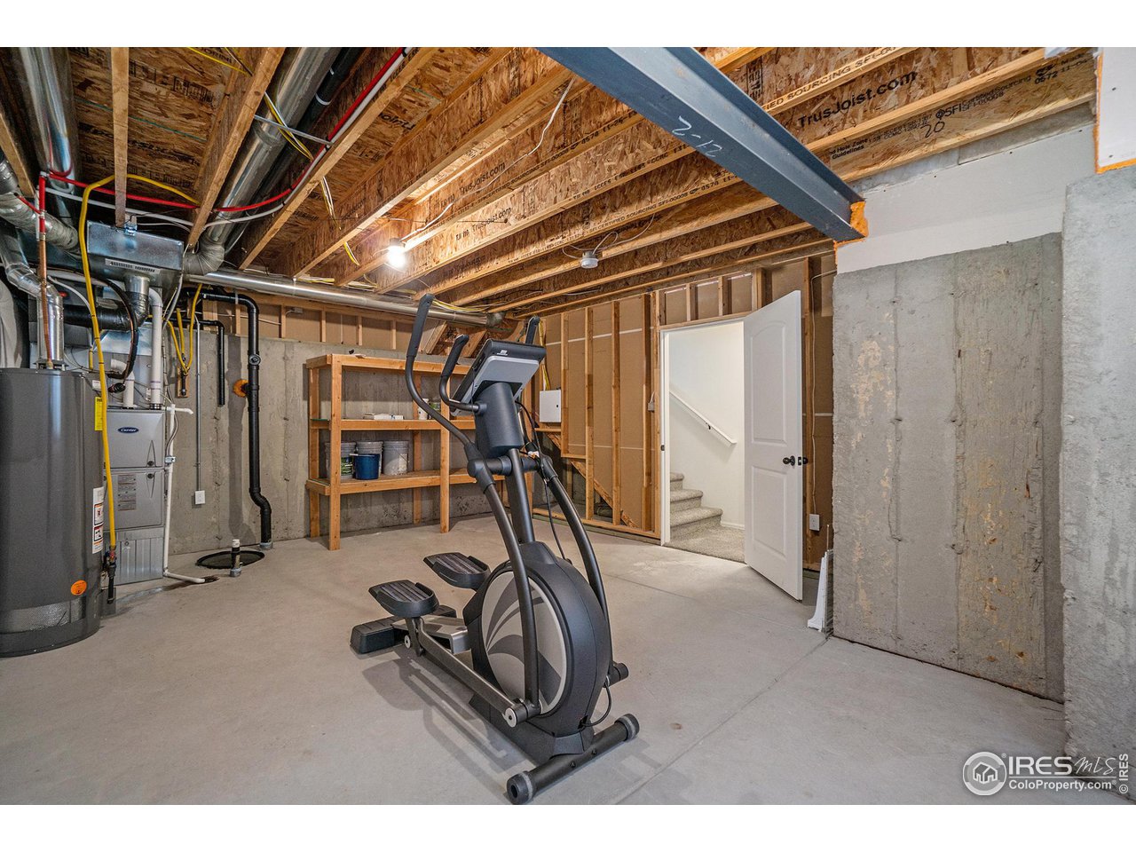 4386 Cypress Ridge Lane Wellington, CO 80549 - Photo 27 of 30 a view of a room with gym equipment