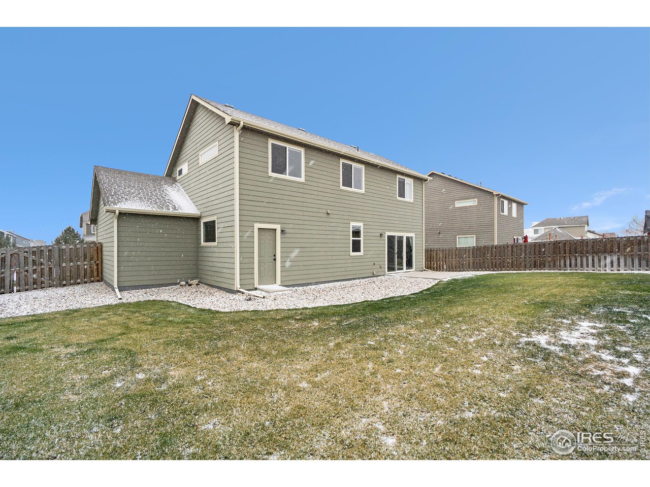 4386 Cypress Ridge Lane Wellington, CO 80549 - Photo 28 of 30 a view of a house with backyard and pool