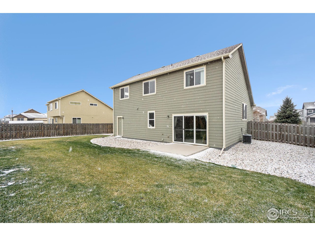 4386 Cypress Ridge Lane Wellington, CO 80549 - Photo 29 of 30 a house view with a backyard space