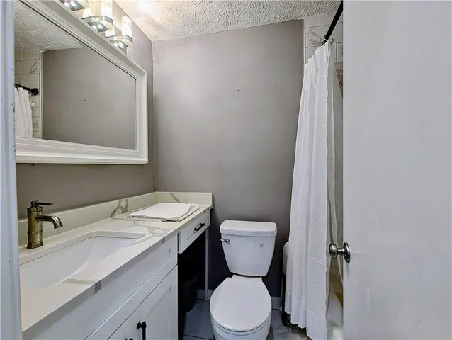 a view of a hallway with closet area