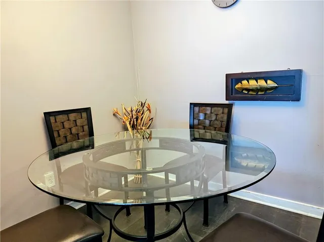 a view of a workspace area with furniture