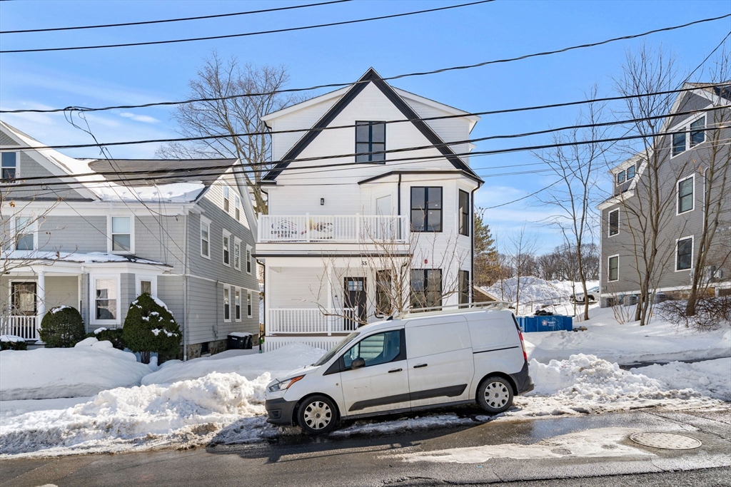 53 Dustin Street, Unit 2 Boston, MA 02135 - Photo 20 of 21 a car parked on the side of a street