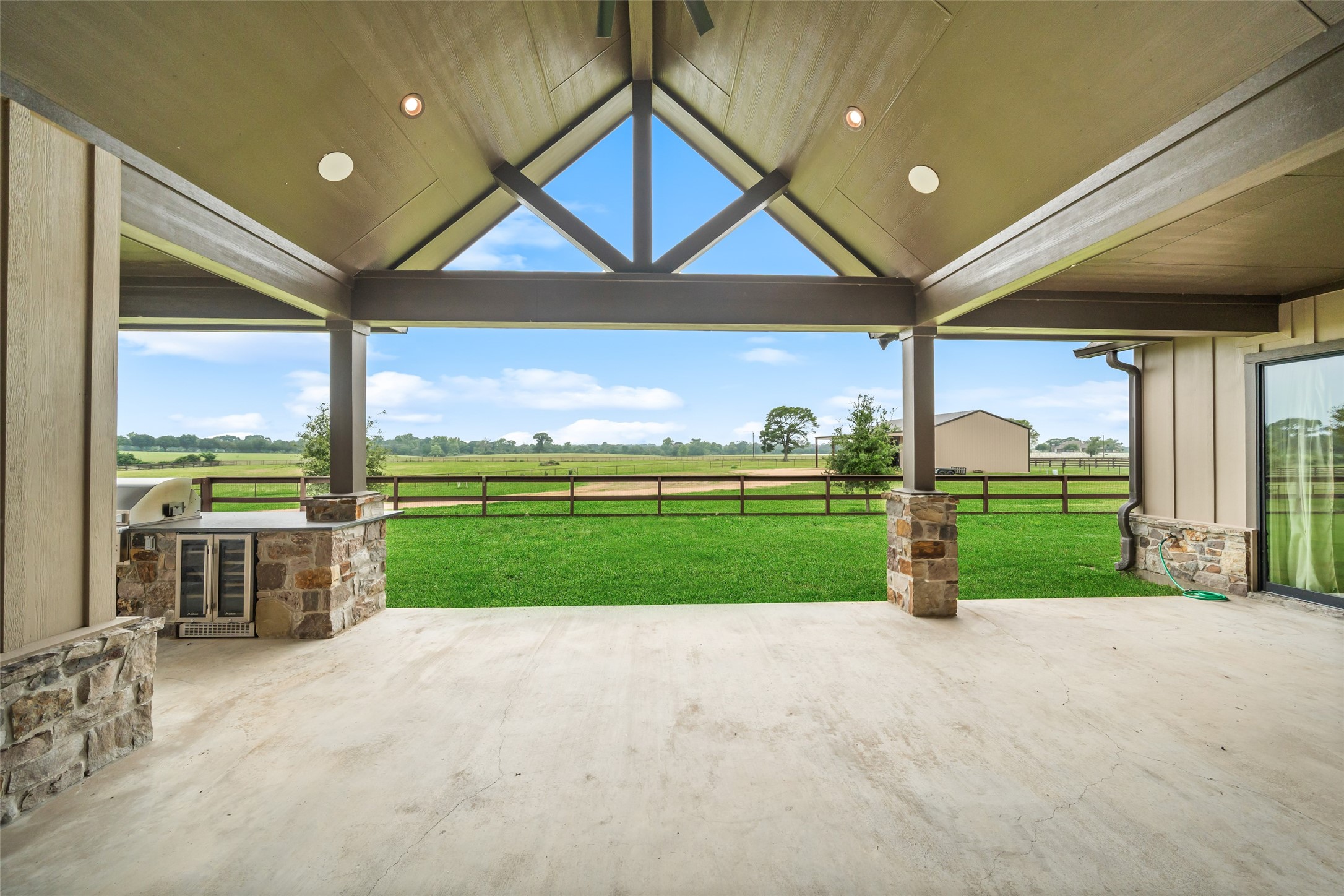 30163 High Spirit Ranch Road Hempstead, TX 77445 - Photo 35 of 49 a view of a house with a big yard and potted plants