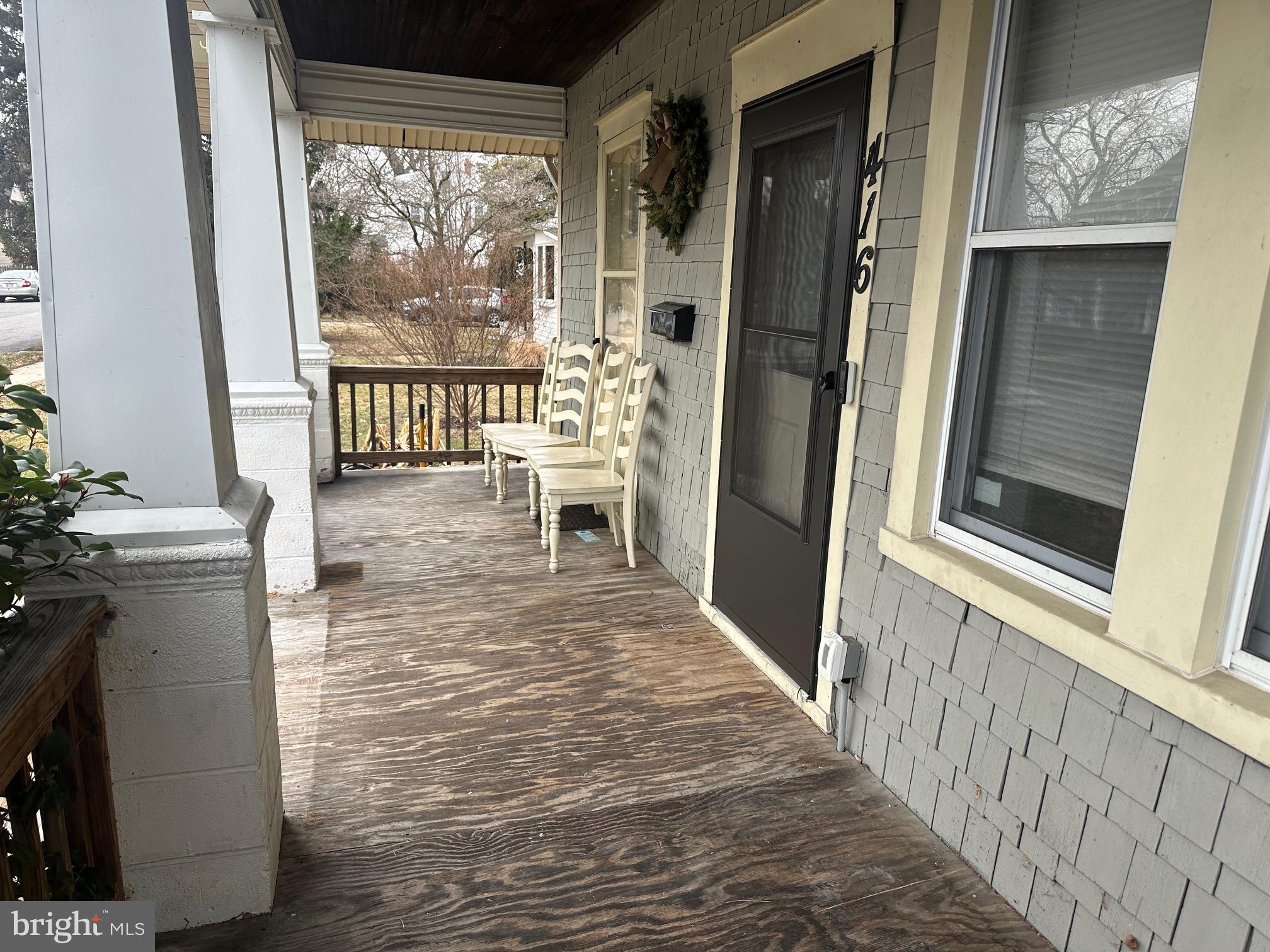 416 Cleveland Road Linthicum Heights, MD 21090 - Photo 17 of 17 a view of a hallway with wooden floor and furniture
