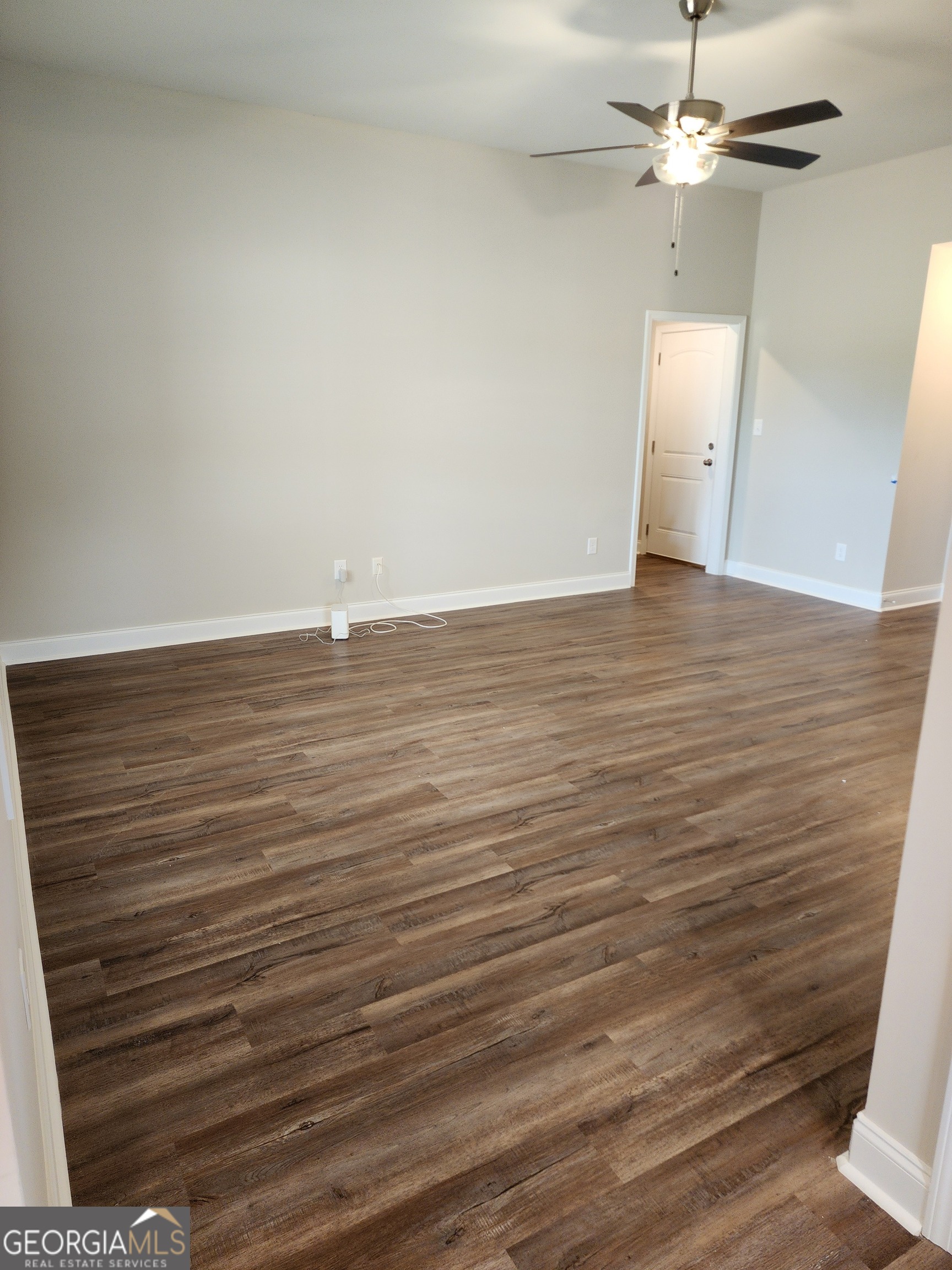 110 Rocky Road Perry, GA 31069 - Photo 2 of 10 wooden floor in an empty room