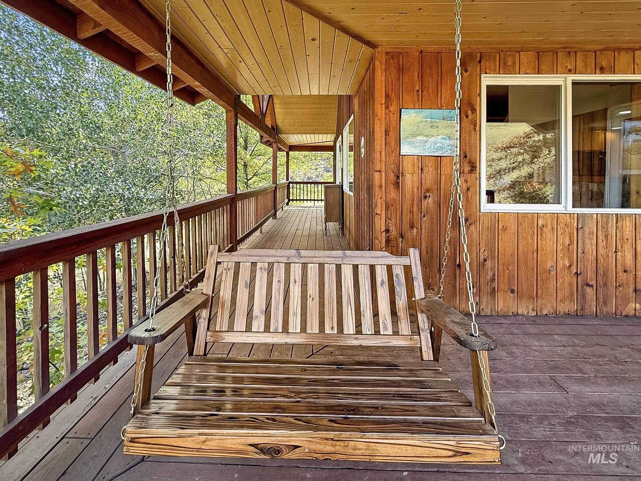 231 Gregory Crk Road, Unit WHITE White Bird, ID 83554 - Photo 26 of 49 Swing on Wrap-around porch