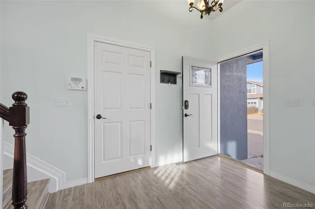 a view of empty room with closet