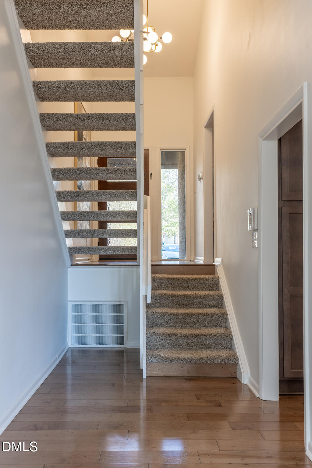 708 Constitution Drive, Unit F Durham, NC 27705 - Photo 11 of 53 a view of entryway and hall with wooden floor