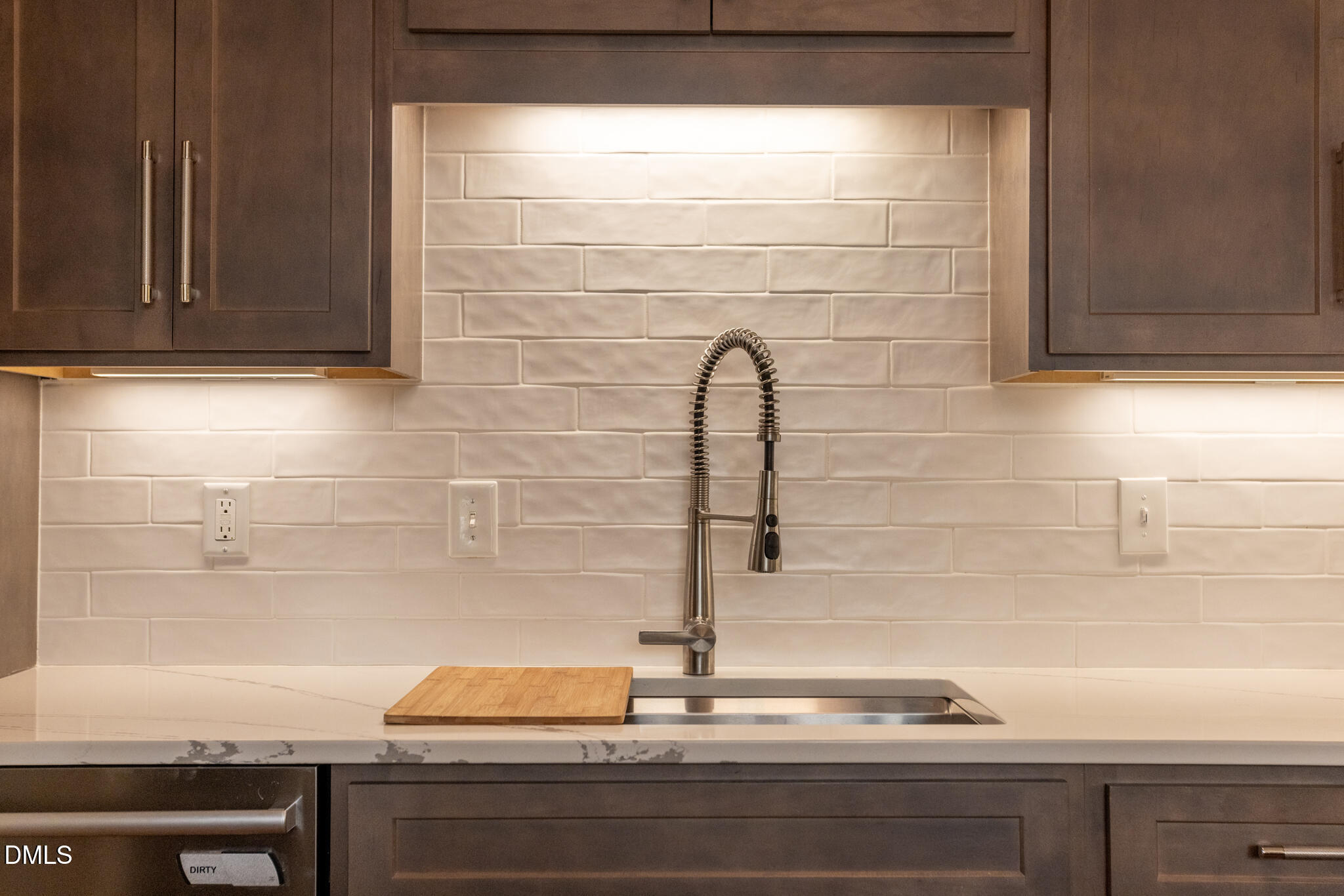 708 Constitution Drive, Unit F Durham, NC 27705 - Photo 16 of 53 a close view of sink and tap