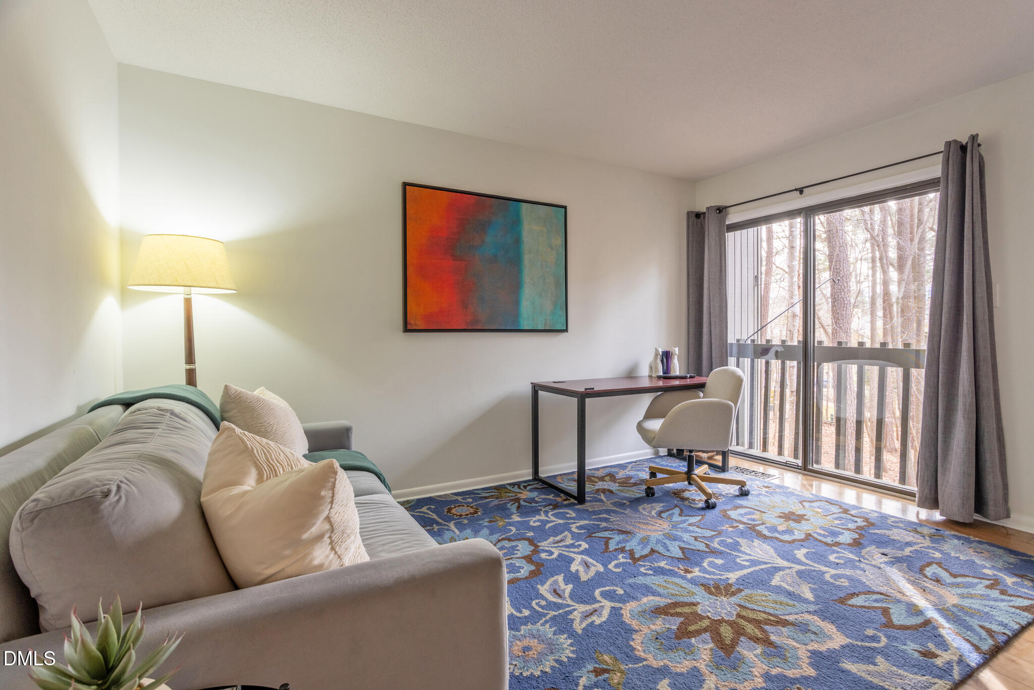 708 Constitution Drive, Unit F Durham, NC 27705 - Photo 27 of 53 a living room with furniture and a window