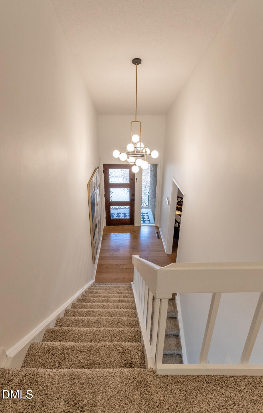708 Constitution Drive, Unit F Durham, NC 27705 - Photo 33 of 53 a view of entryway and hall with wooden floor