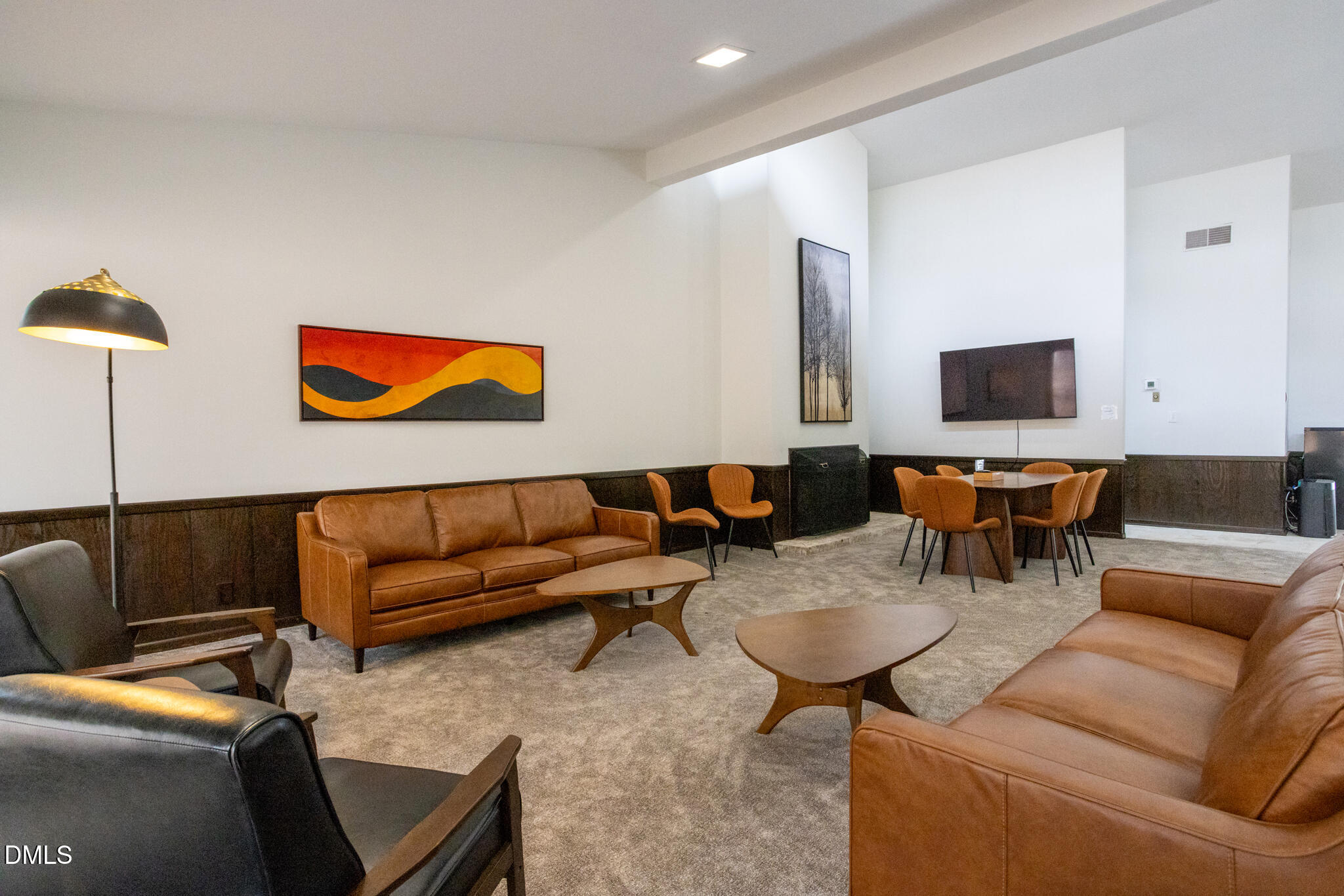 708 Constitution Drive, Unit F Durham, NC 27705 - Photo 51 of 53 a living room with furniture and a flat screen tv