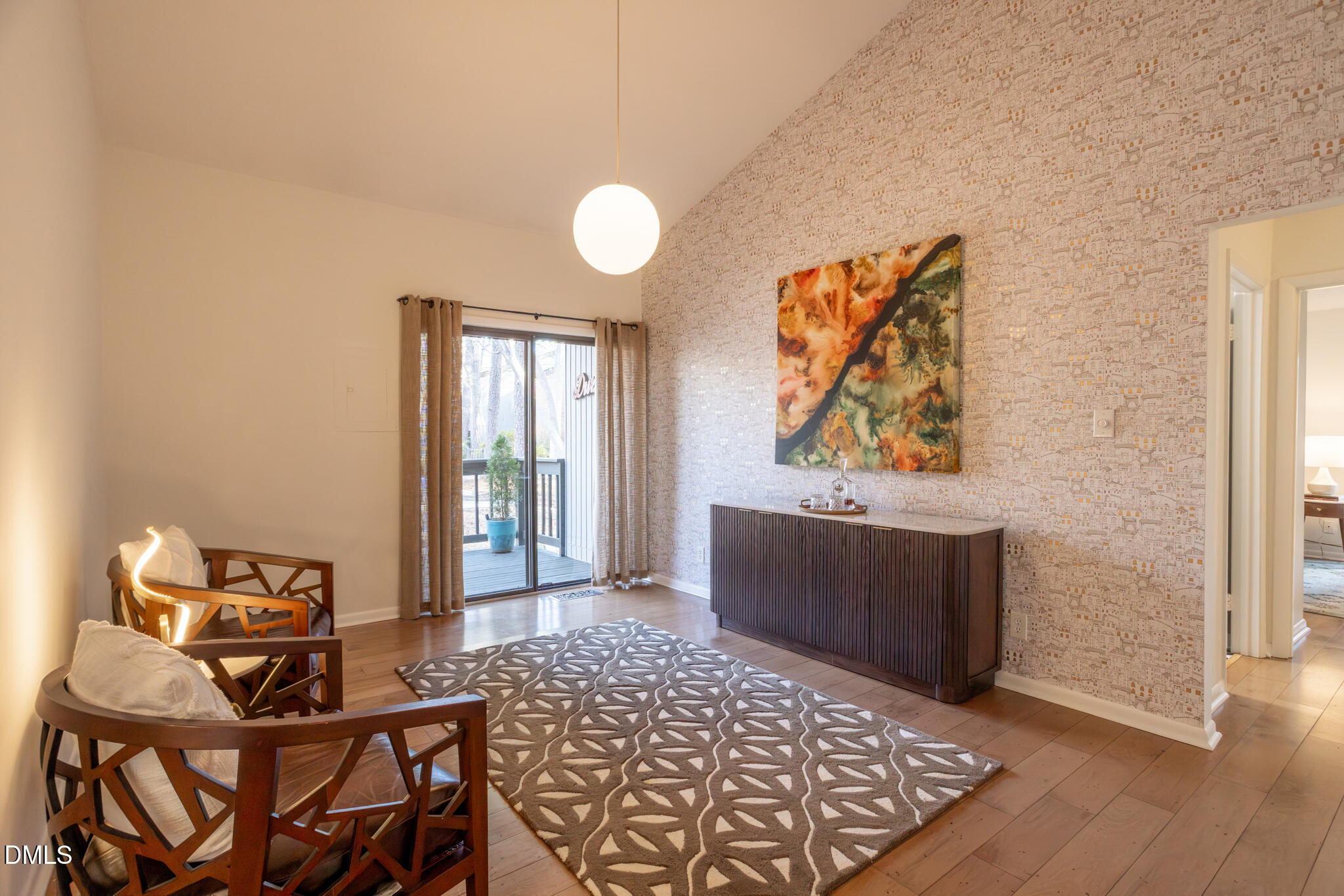 708 Constitution Drive, Unit F Durham, NC 27705 - Photo 9 of 48 a view of a workspace with furniture and wooden floor