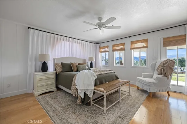 a bathroom with a double vanity sink mirror and bathtub