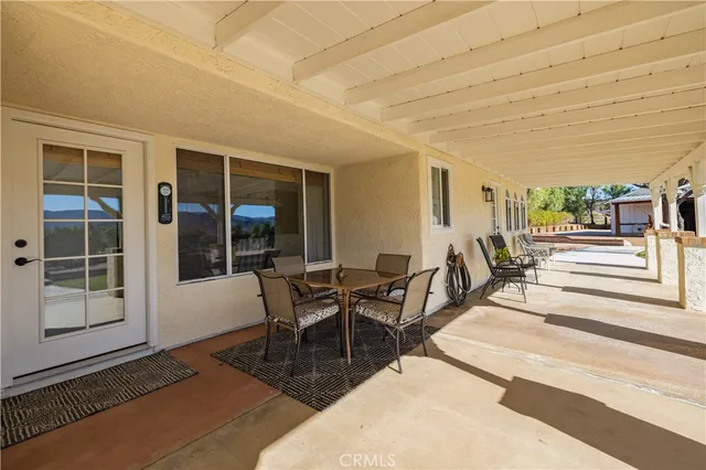 a view of parking garage with furniture