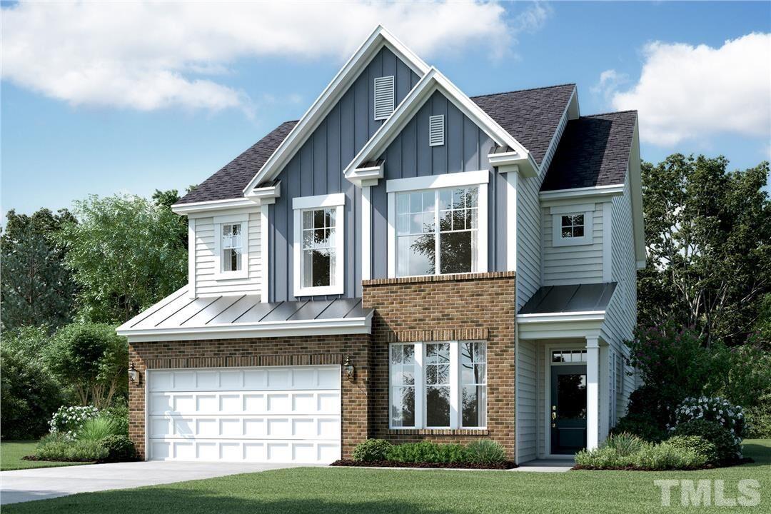 2105 Goudy Drive Raleigh, NC 27615 - Photo 1 of 1 a front view of a house with garden