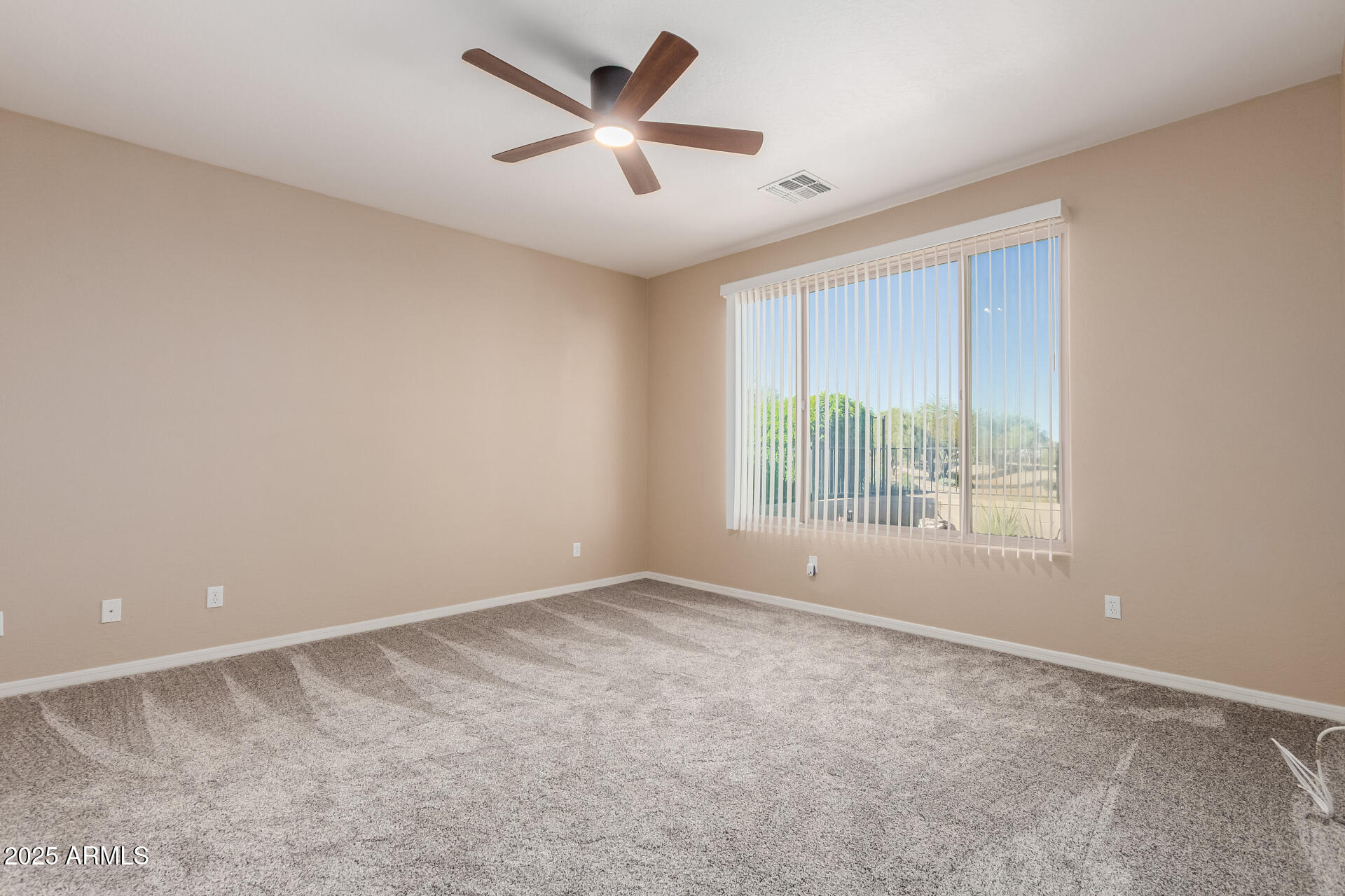 32270 Echo Canyon Road San Tan Valley, AZ 85143 - Photo 14 of 28 a view of an empty room with a window