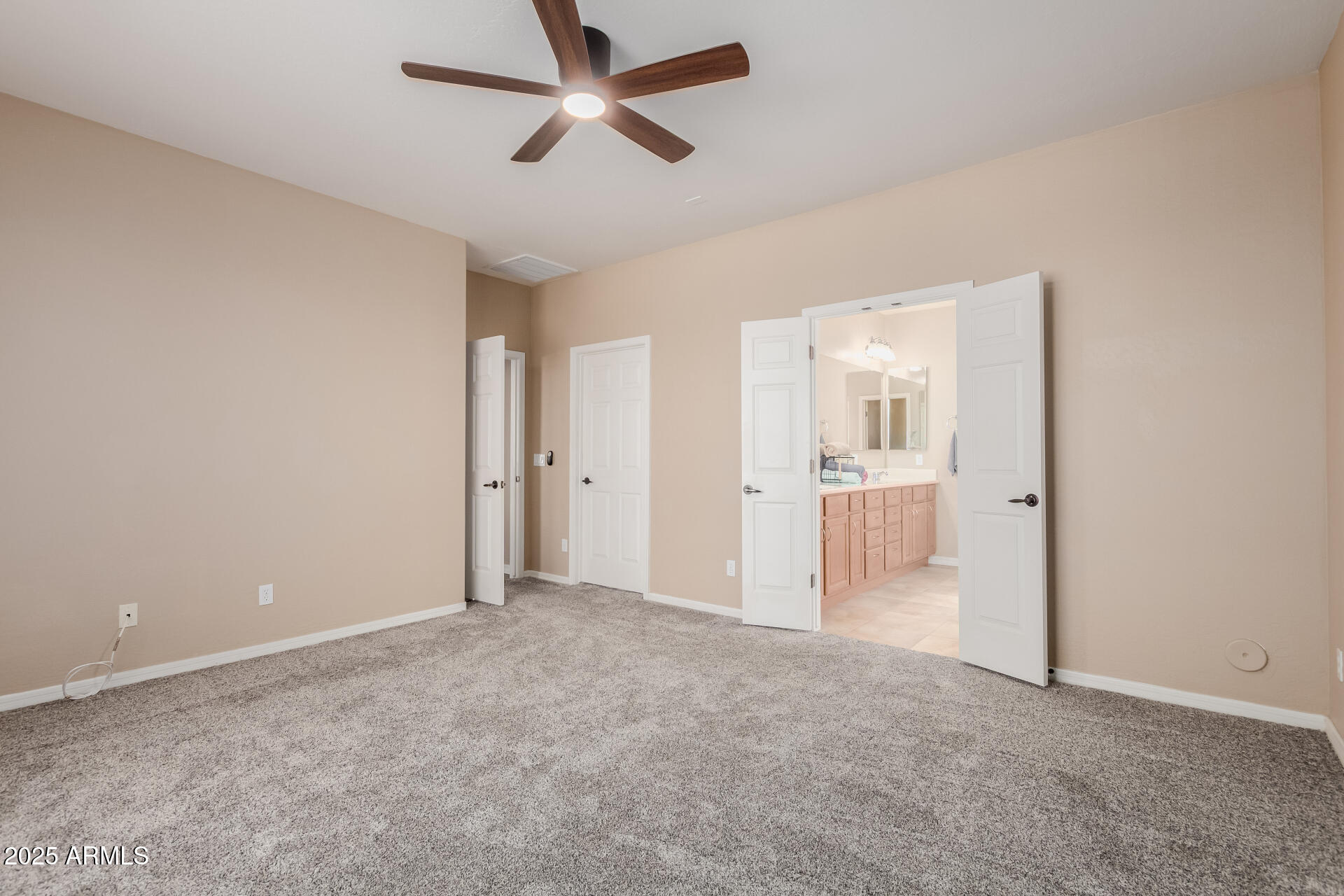 32270 Echo Canyon Road San Tan Valley, AZ 85143 - Photo 15 of 28 a view of a big room with wooden floor and windows