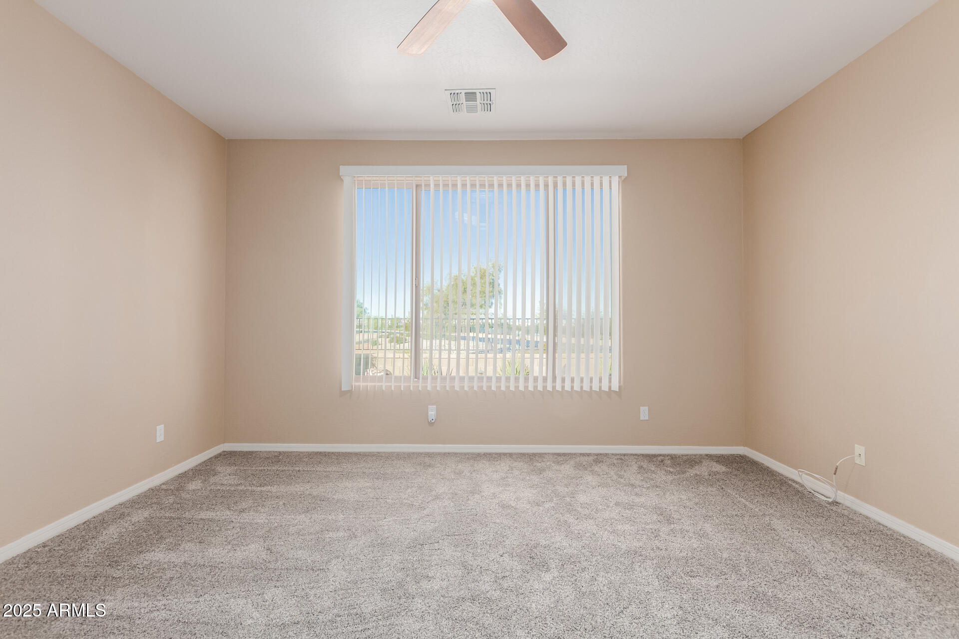 32270 Echo Canyon Road San Tan Valley, AZ 85143 - Photo 16 of 28 an empty room with a window