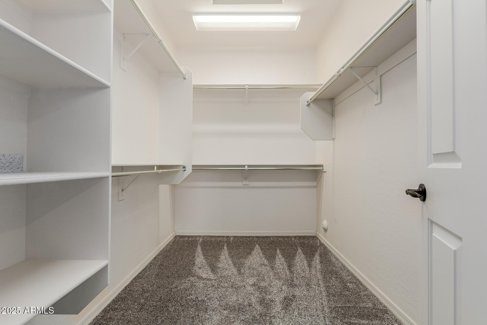 32270 Echo Canyon Road San Tan Valley, AZ 85143 - Photo 19 of 28 a view of a room with shelf