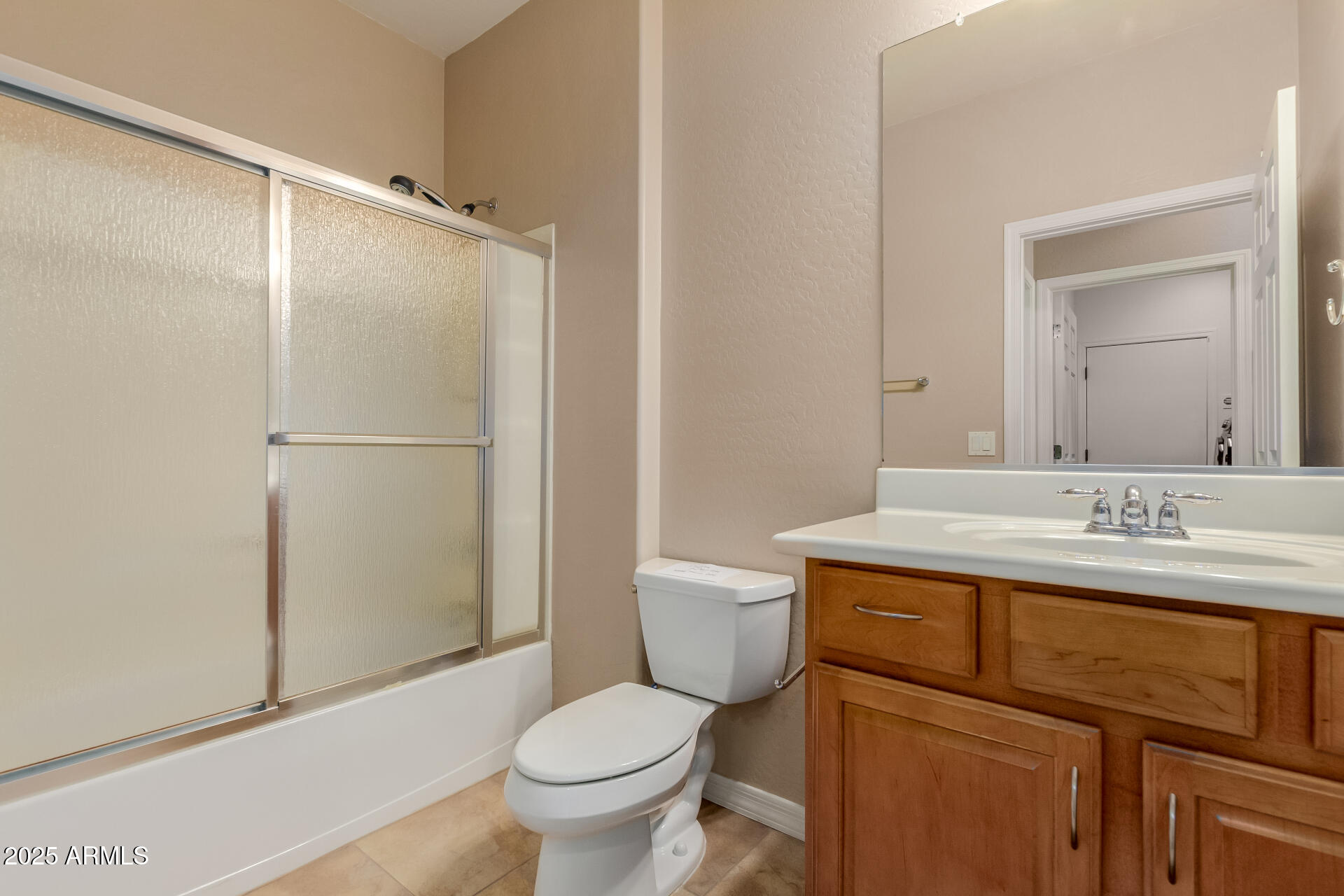 32270 Echo Canyon Road San Tan Valley, AZ 85143 - Photo 22 of 28 a bathroom with a granite countertop sink toilet and shower