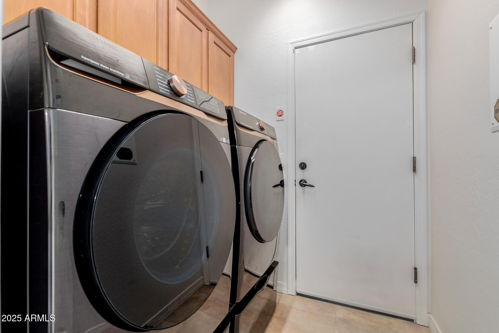 32270 Echo Canyon Road San Tan Valley, AZ 85143 - Photo 23 of 28 a utility room with dryer and washer