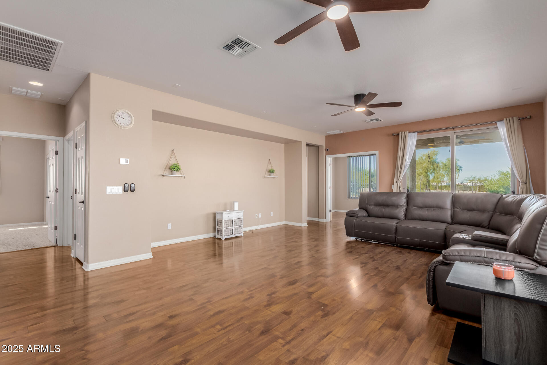 32270 Echo Canyon Road San Tan Valley, AZ 85143 - Photo 5 of 28 a living room with furniture and wooden floor