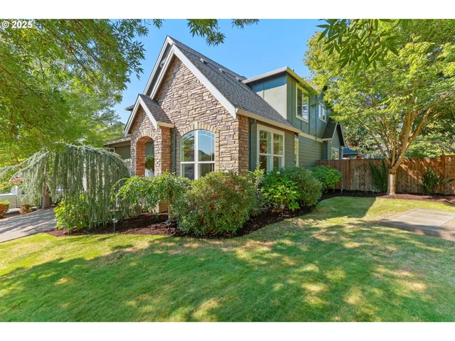 a view of backyard of a house