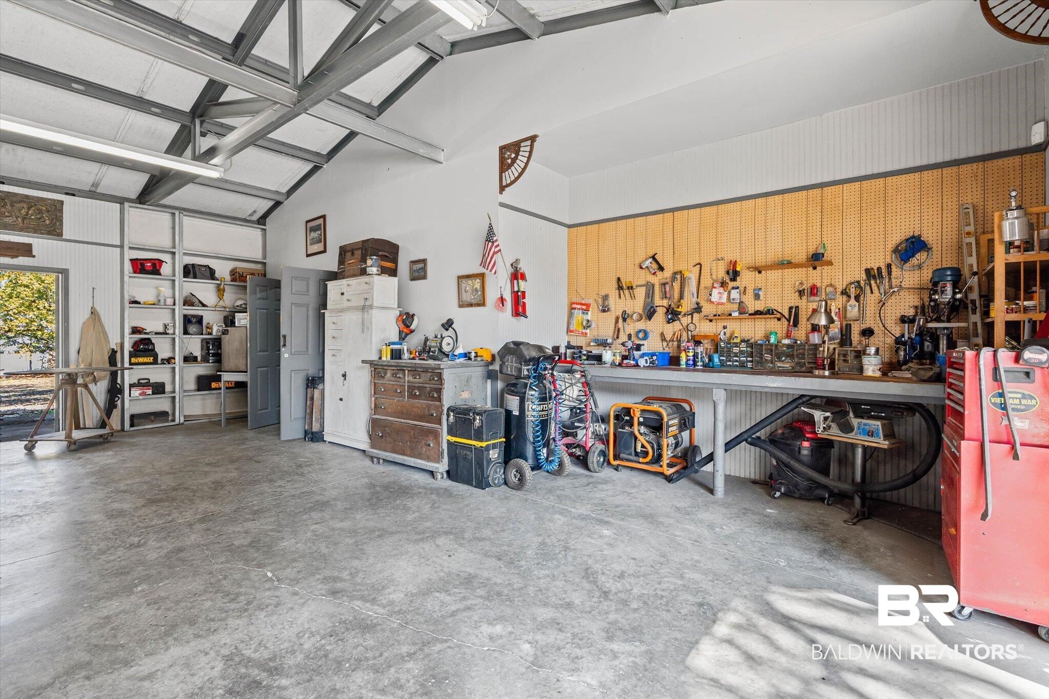 3846 Leslie Road Saraland, AL 36571 - Photo 30 of 40 Garage featuring a workshop area and a heating unit