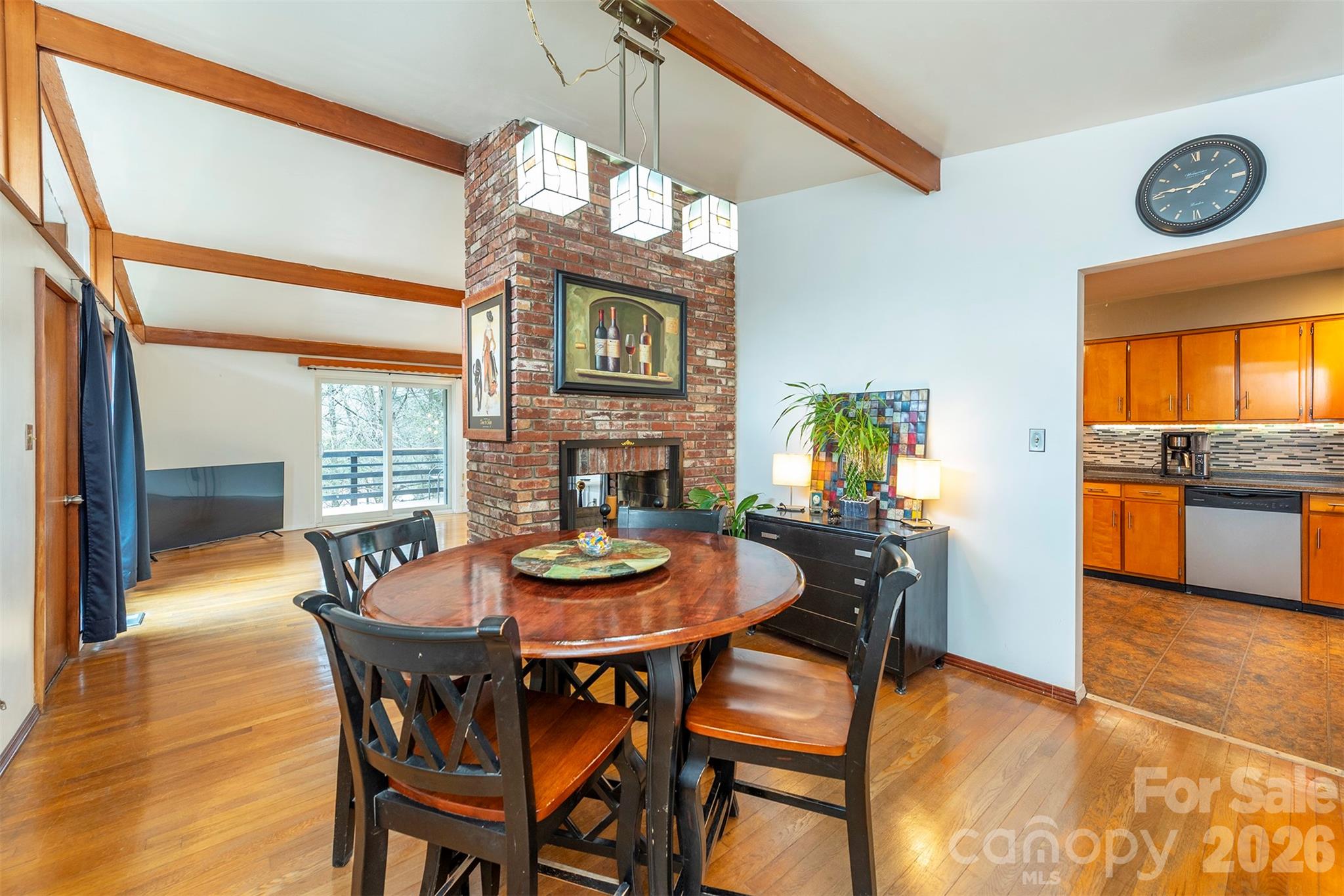 4 Stockwood Road Asheville, NC 28803 - Photo 11 of 41 a view of a dining room with furniture and a chandelier