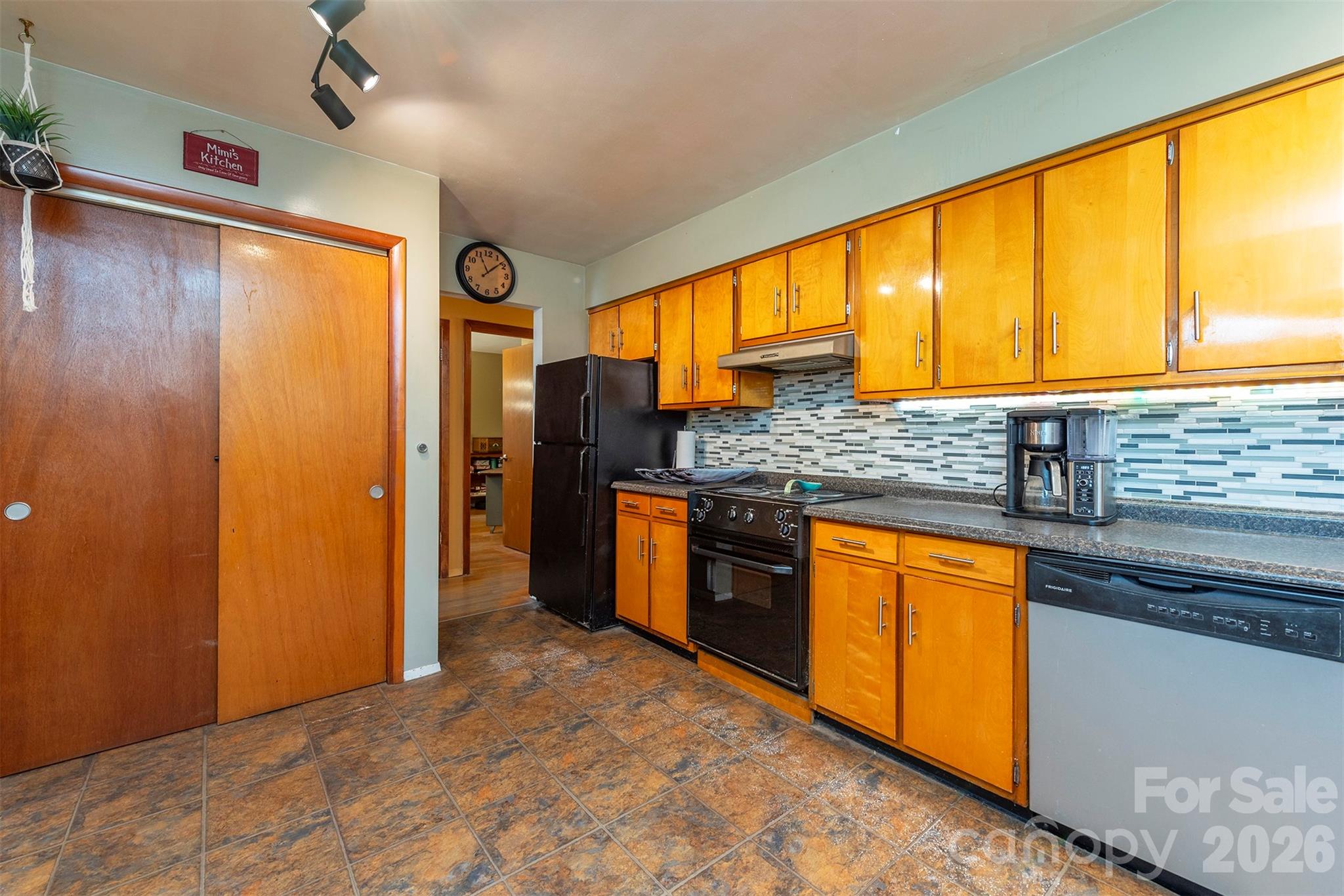 4 Stockwood Road Asheville, NC 28803 - Photo 15 of 41 a kitchen with stainless steel appliances granite countertop a refrigerator and a sink