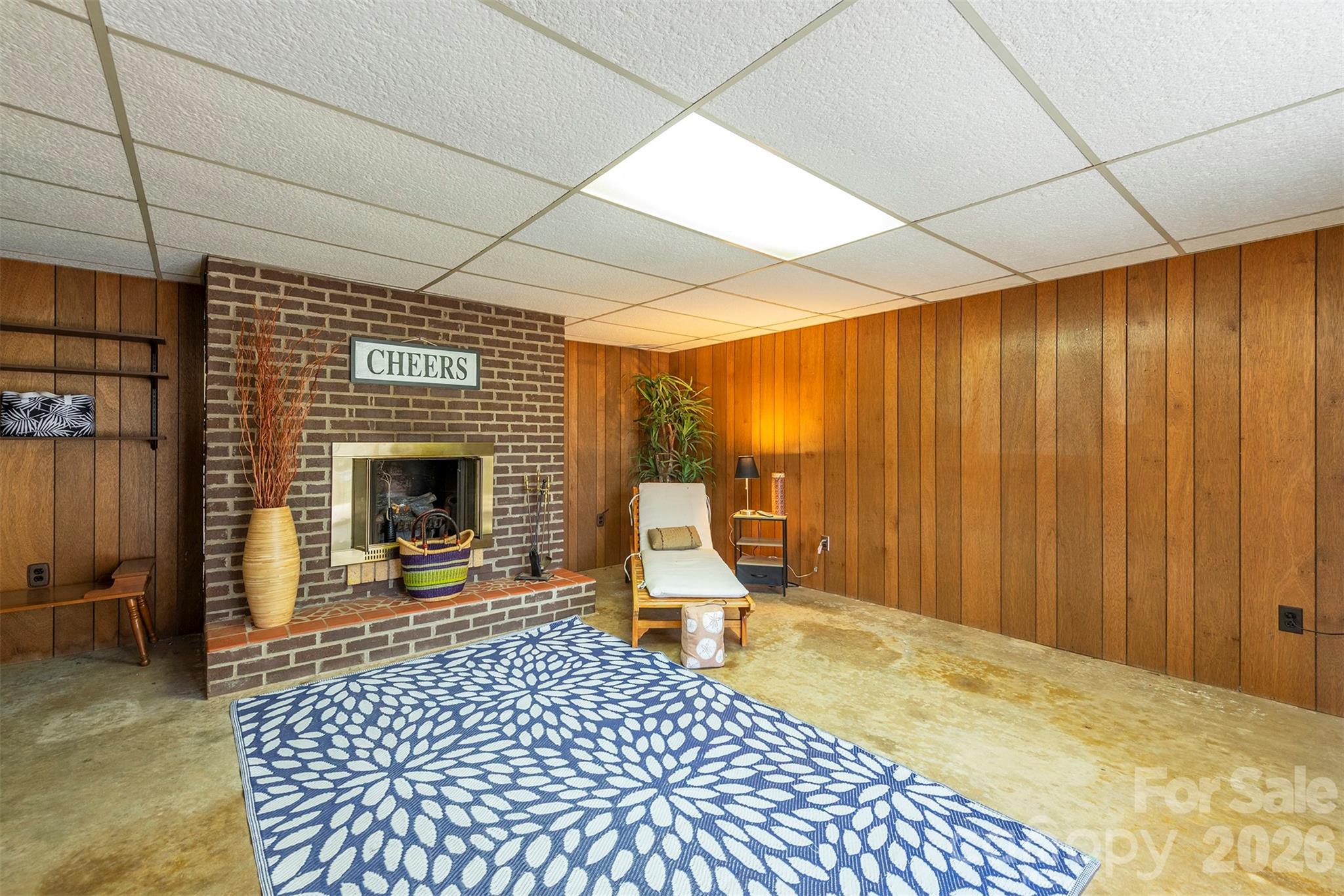 4 Stockwood Road Asheville, NC 28803 - Photo 26 of 41 a bedroom with a bed and a fireplace