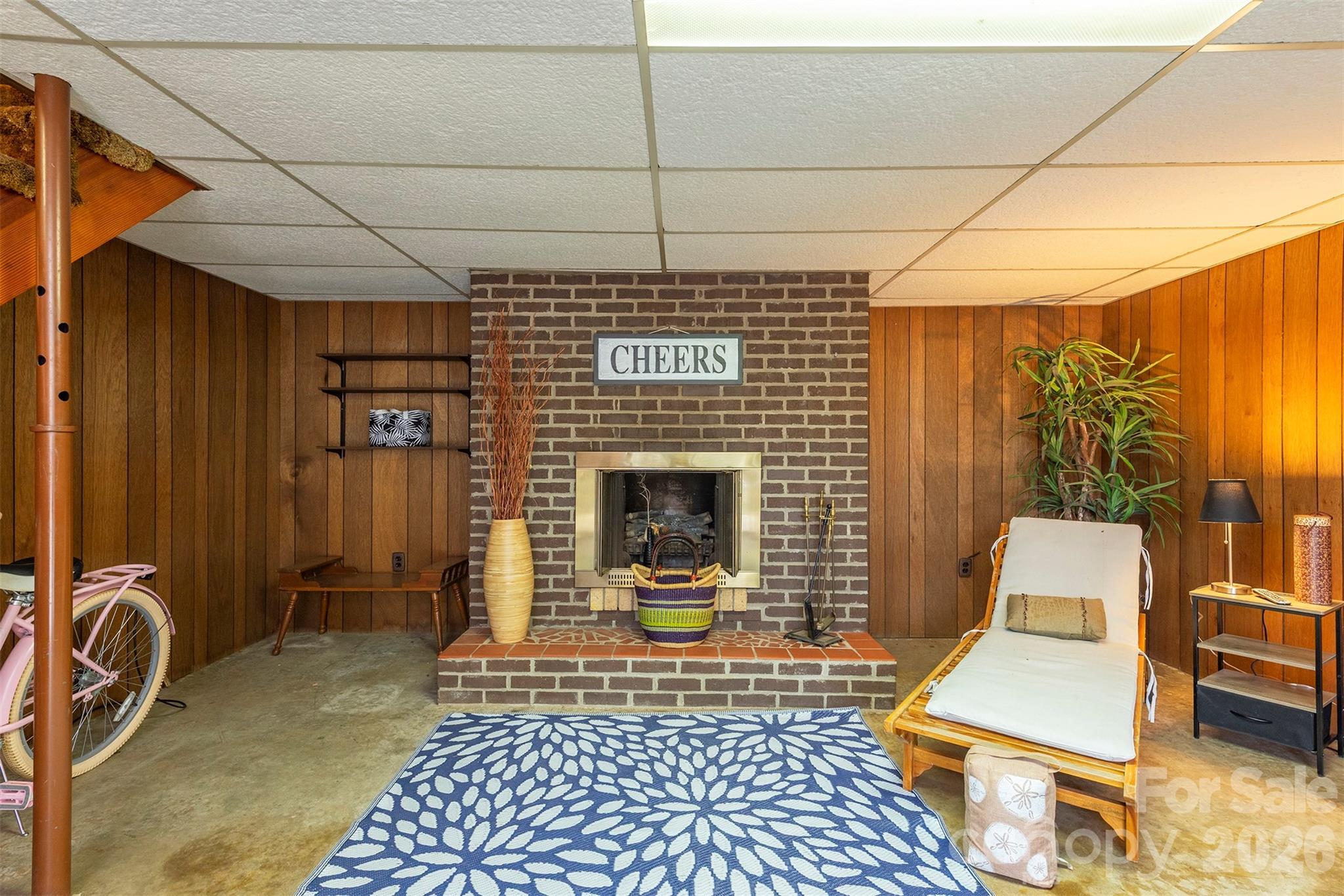4 Stockwood Road Asheville, NC 28803 - Photo 27 of 41 a view of a patio with table and chairs with wooden floor and fence