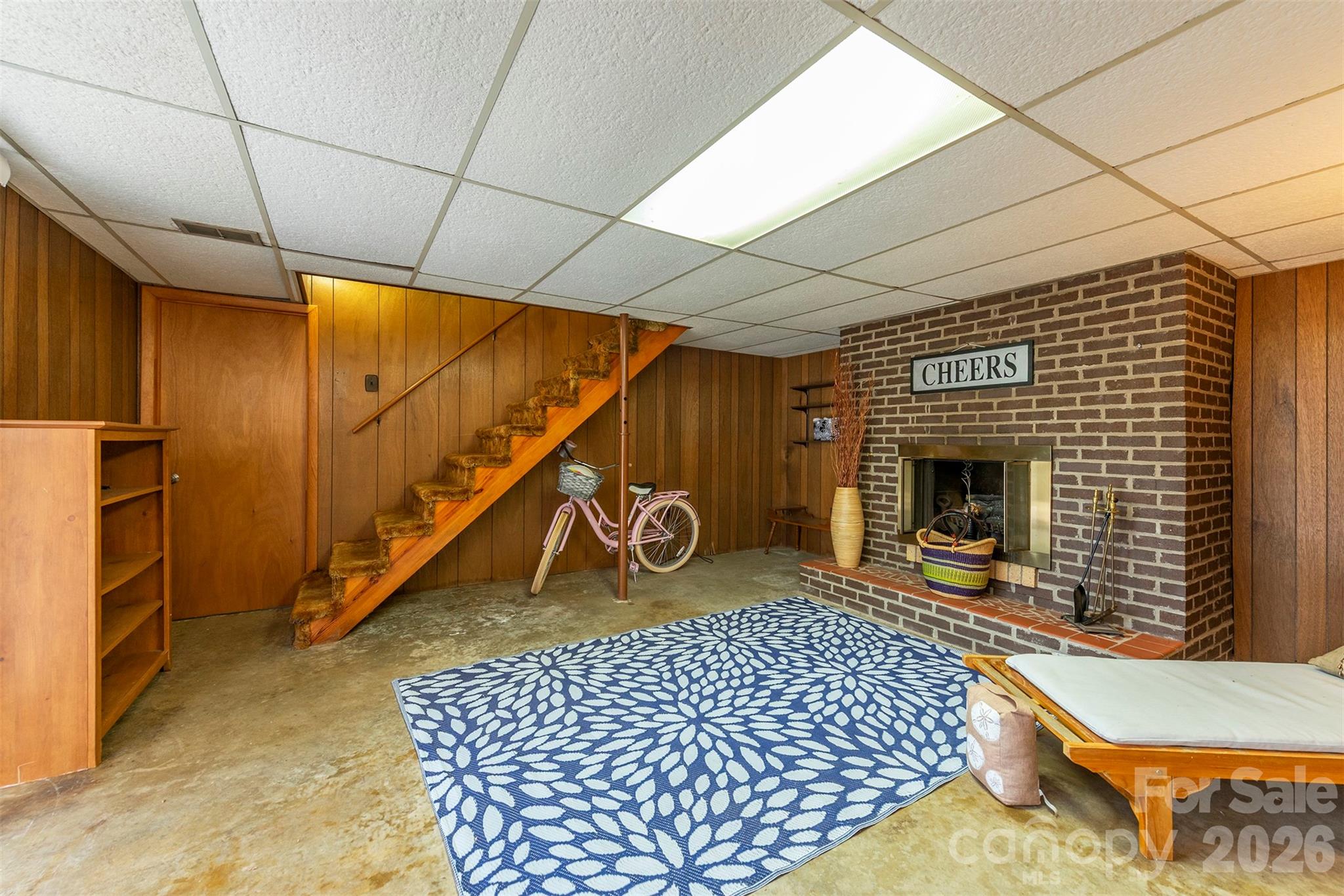 4 Stockwood Road Asheville, NC 28803 - Photo 28 of 41 a room with wooden floor pool table and chairs
