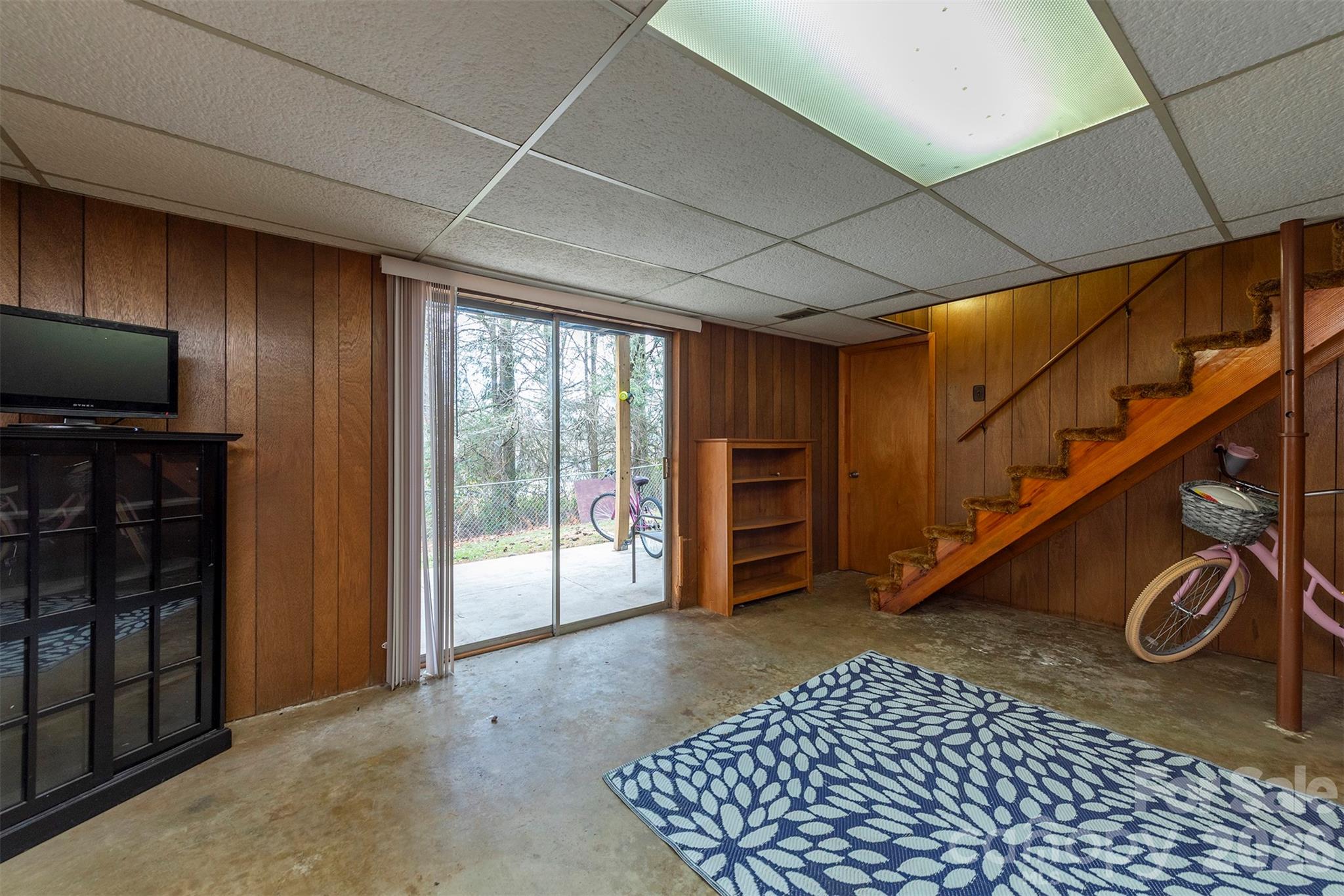 4 Stockwood Road Asheville, NC 28803 - Photo 29 of 41 a view of an empty room with a staircase