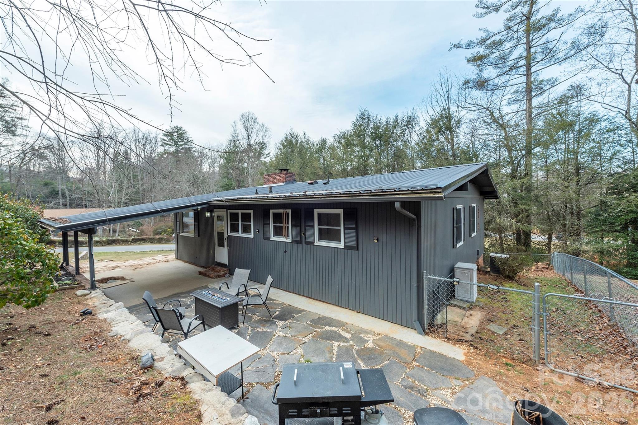 4 Stockwood Road Asheville, NC 28803 - Photo 3 of 41 a view of a patio on the deck